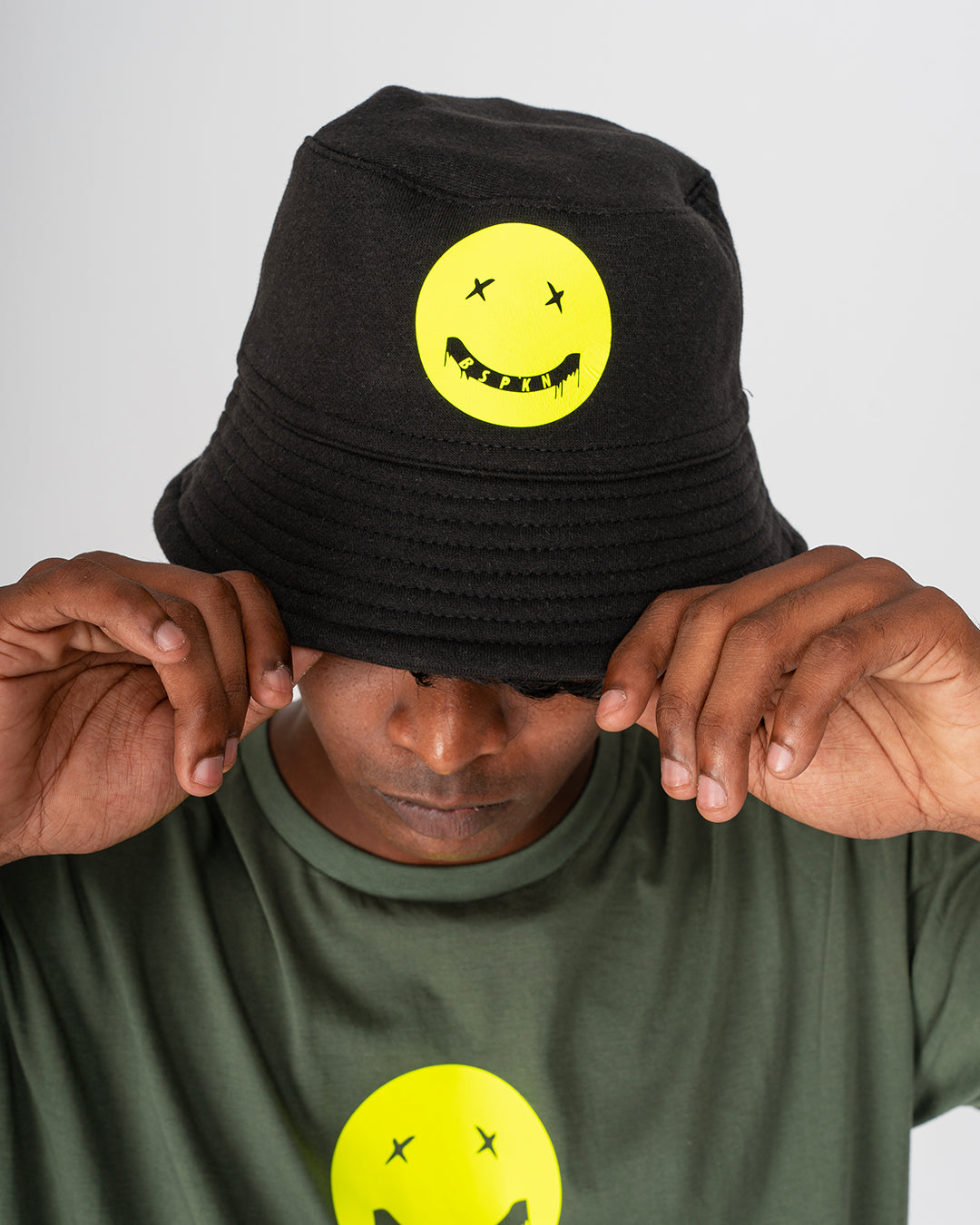 Black Bucket hat with Neon Smile BSPKN. Print