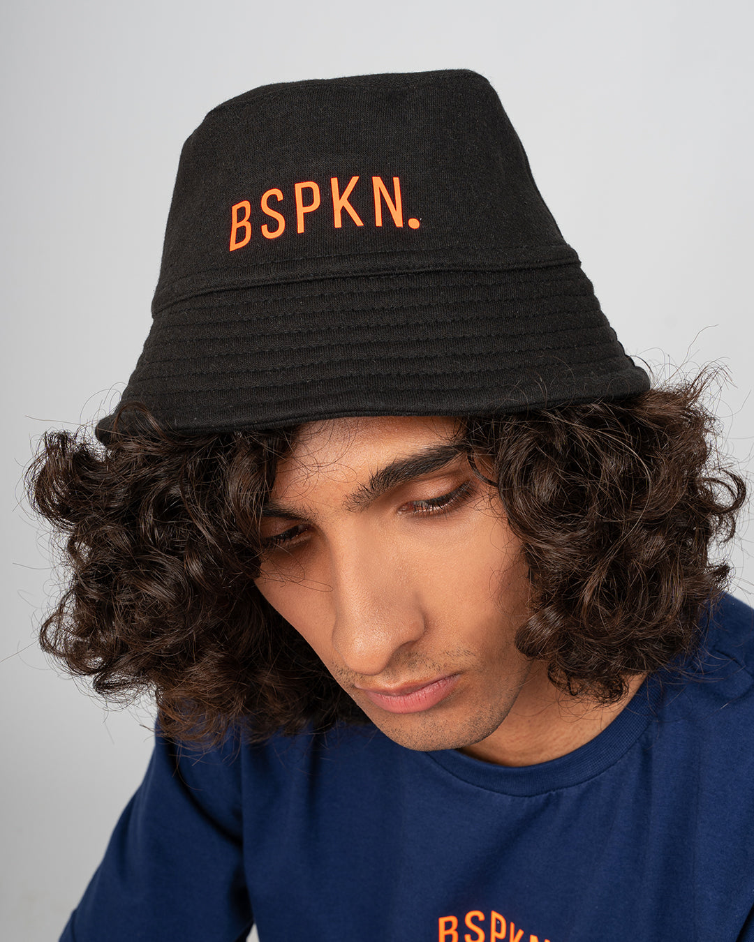 Black Bucket Hat with Orange BSPKN. Print